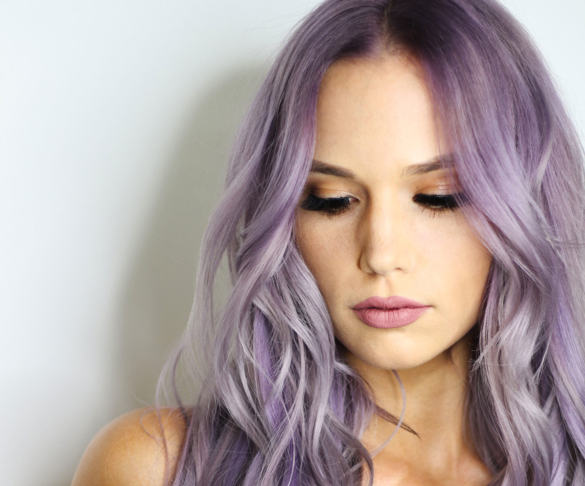 Beautiful purple hair color by Poiema Salon